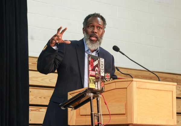 DJ and Professor of African Studies Todd Craig speaks at the all-school assembly that took place Feb. 13. During the event, he presented music to the audience and lectured on the evolution of DJs and music sampling over the years.
