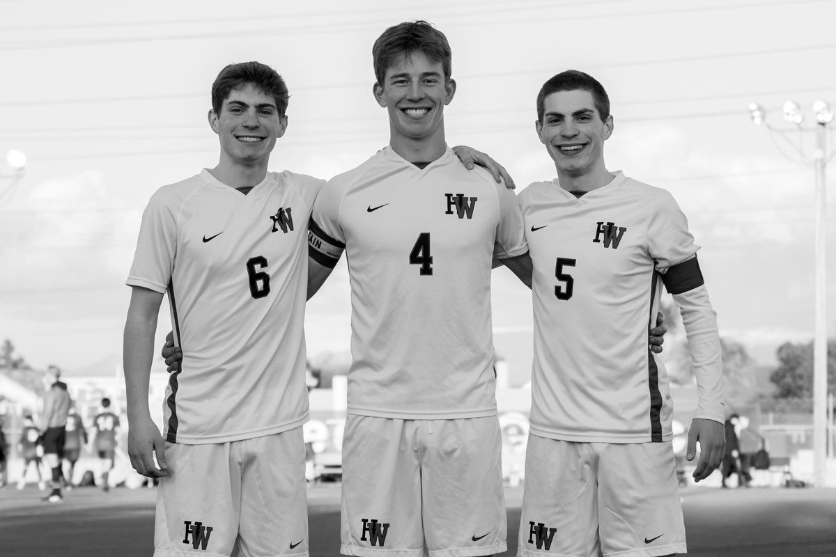 From left to right, seniors Nathan Casamassima 24, JT Federman 24 and Spencer Casamassima  24 stand together for a photo before their second-round matchup with Edison High School. Federman and Nathan Casamassima each scored one of the teams two goals, Nathan Casamassimas being a golden-goal that sent the team to the quarterfinals after being tied 1-1 in regulation.  