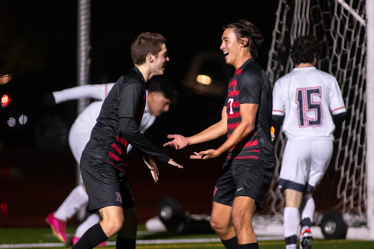 Spencer Casamassima 24 and Josh Barnavon 24 celebrate in a game against Chaminade on Jan. 3.