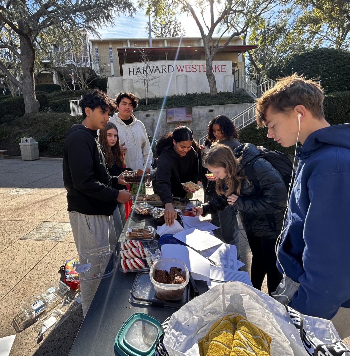 Students peruse through the First Generation and Immigrant Ally Club (1GIAC) bake sale on the Quad. Proceeds were donated to Middle Eastern refugees immigrating to the United States.
