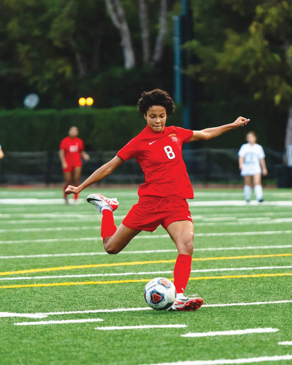 Striker Kaia Santomarco-King ’26 rears up to deliver a ball. Only in her sophomore season, she has been crucial to the team’s success.