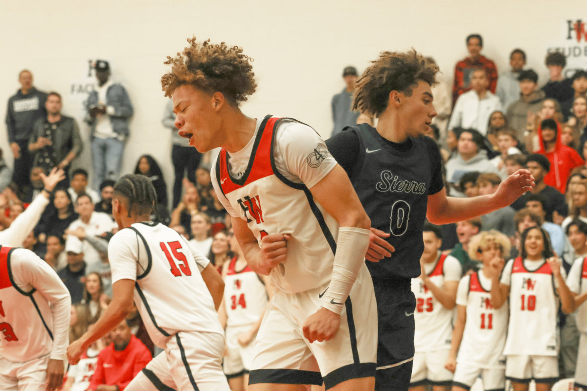 Senior guard Trent Perry 24 celebrates after scoring in a playoff game against Sierra Canyon High School on Feb. 13.