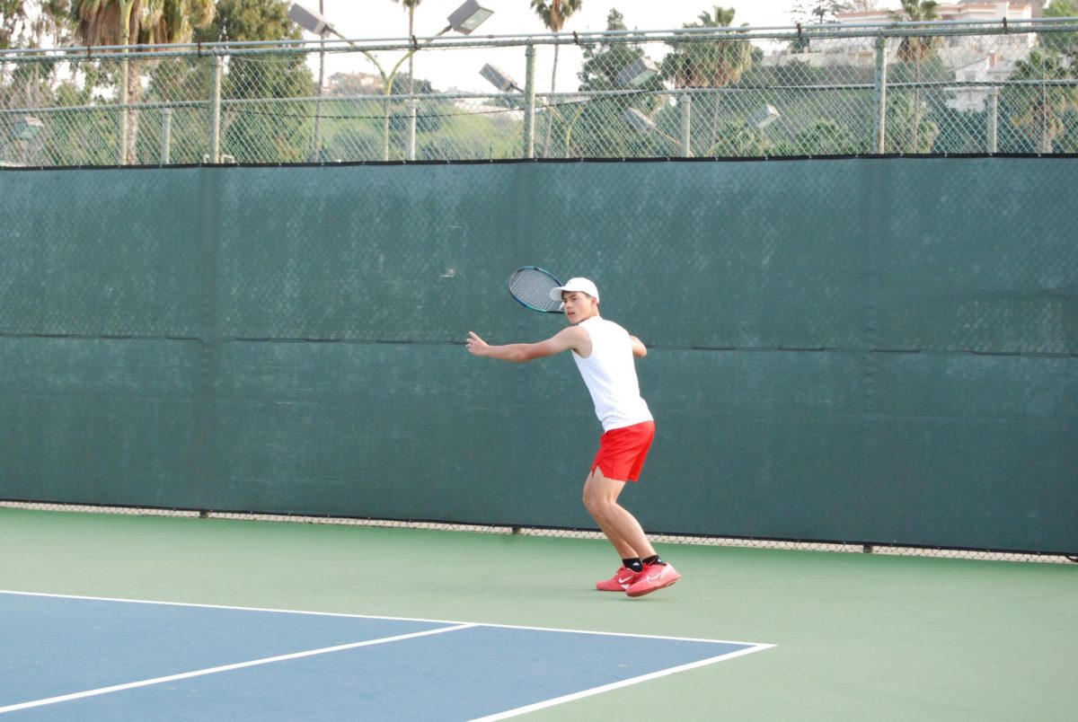 Christian Stubbeman 25 prepares to hit a forehand in a match against Peninsula. 