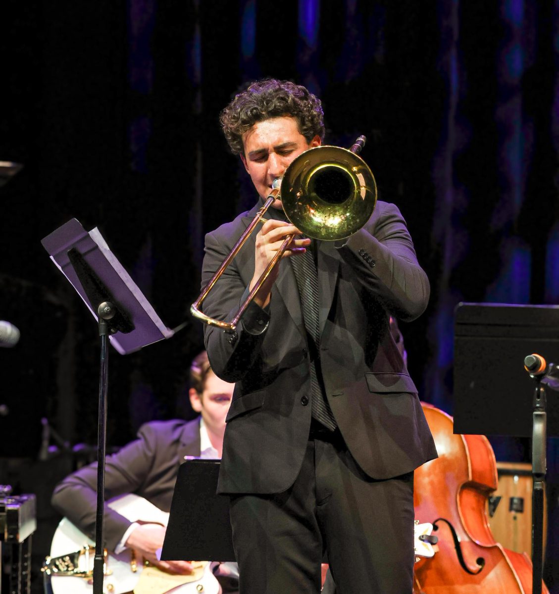 Trombone player Andre Touloumian 24 plays his rendition of Golden Cress by Duke Ellington. All upper school jazz groups played in the concert, and the lower schools Jazz Band was also invited to play.