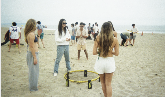 Seniors play games on the beach on the annual Senior Ditch Day.