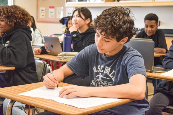 An eighth-grade student works during a science class. Middle school administration unanimously decided in cooperation with an independent company to implement an eight-day block schedule for the 2025-2026 school year.