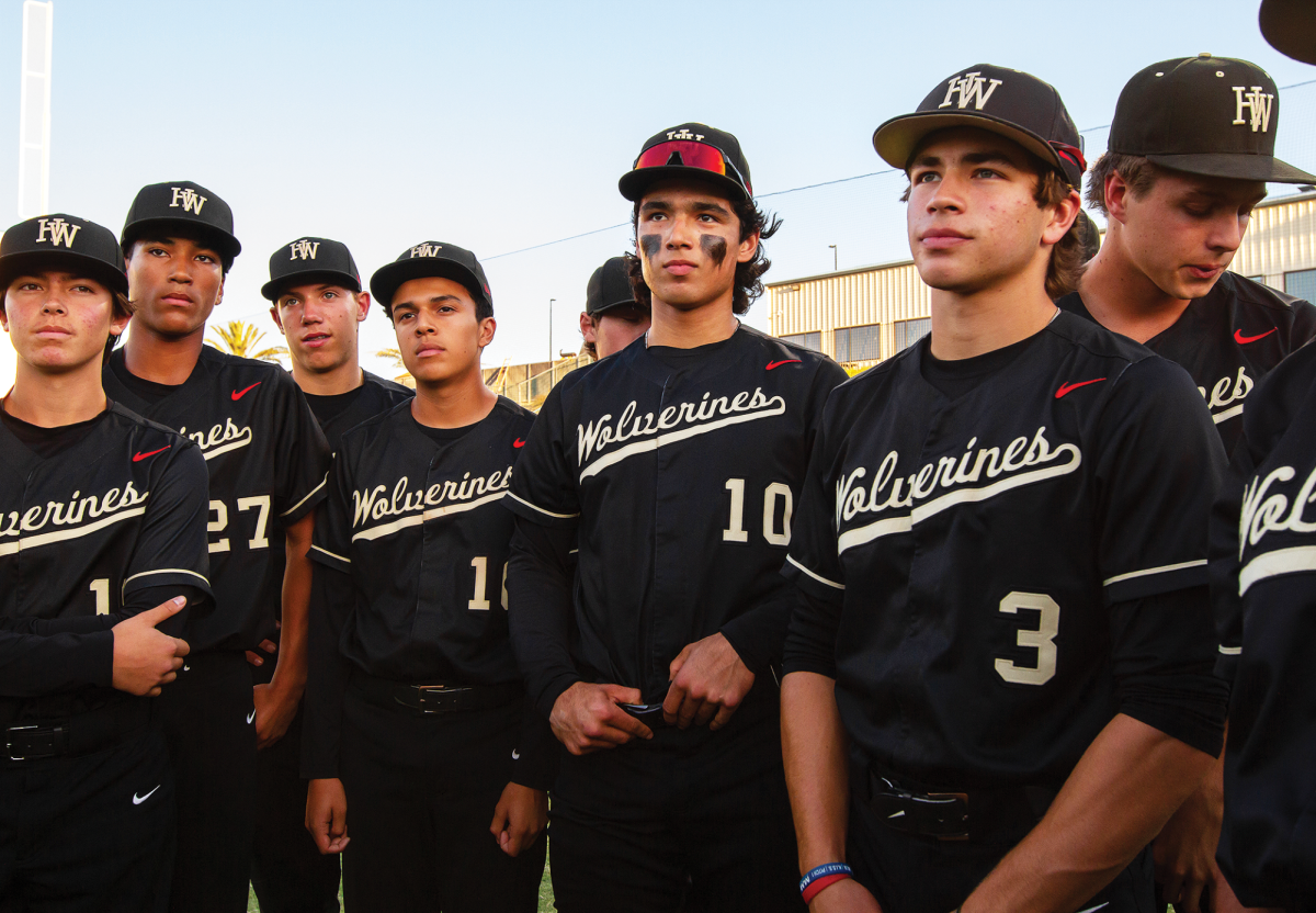 Varsity baseball athletes pay attention to a pregame speech from coaches before their matchup with Corona High School in the CIF-SS Open Division baseball championship May 18.