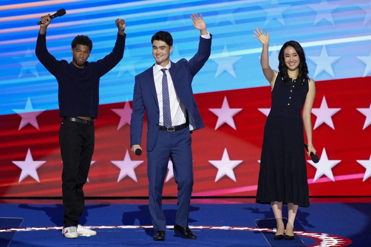 Alexander Hudlin '26, pictured left, stands onstage at the DNC in Chicago, IL on Aug. 21. As Vice President Harris' godson, Hudlin was invited to speak about her family values and character. 