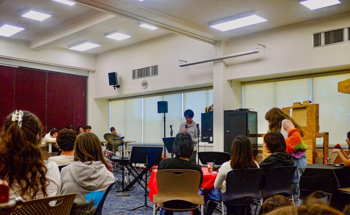 Senior Prefect Victor Suh speaks to attendees of the November Coffee House, which was held in Chalmers Lounge on November 11.