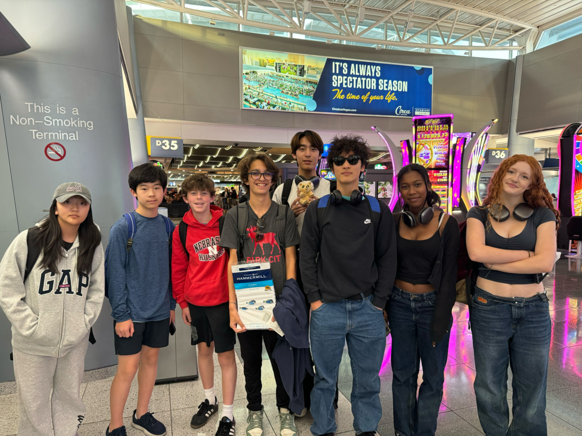 Members of the varsity Lincoln-Douglas debate team pose before competing in The Meadows School Debate Tournament in Nevada. 