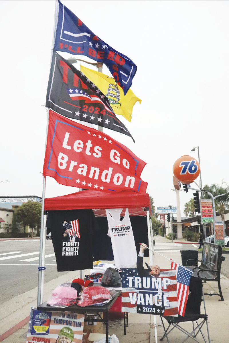 ELECTION BEGINS: In preparation for Election Day, former Democrat Leon David organized a pro-Trump merchandise stand between Ventura Blvd. and Coldwater Canyon Ave. The stand sells clothes and banners advertising for Donald Trump. David said he supports Trump’s stances on freedom of speech and war. Other community members spoke about issues regarding people’s rights.