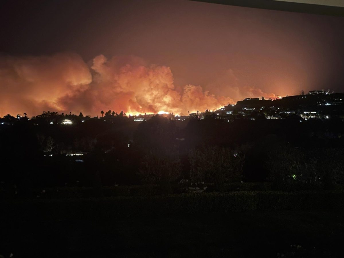 The Sunset Fire burns through Hollywood Hills Wednesday evening. The fire broke out in the afternoon in the Hollywood Hills neighborhood, following the two largest fires, the Palisades Fire and Eaton Fire.