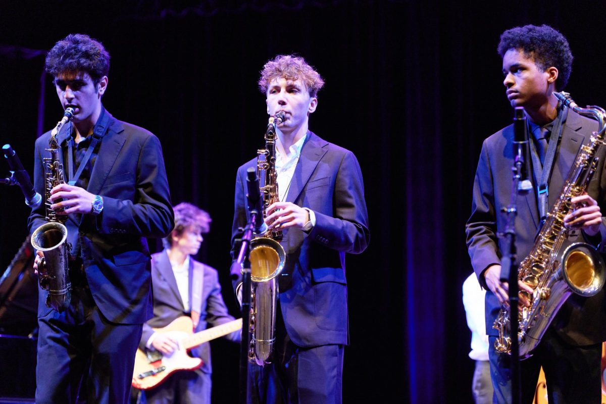 FROM LEFT TO RIGHT: Evan Daneshrad ’27, Adrian Drouin ’26 and
Noah Ramsey ’27 show their jazz musical abilities in front of an audience.