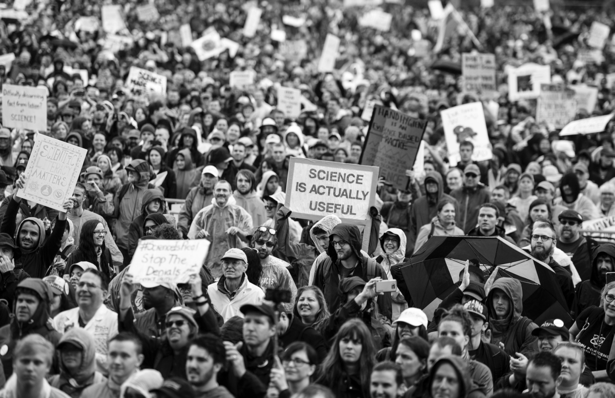 Earth Day 2021, people gather in protest for environmental action. 